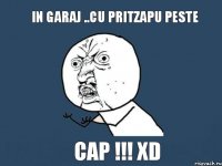 in garaj ..cu pritzapu peste cap !!! XD